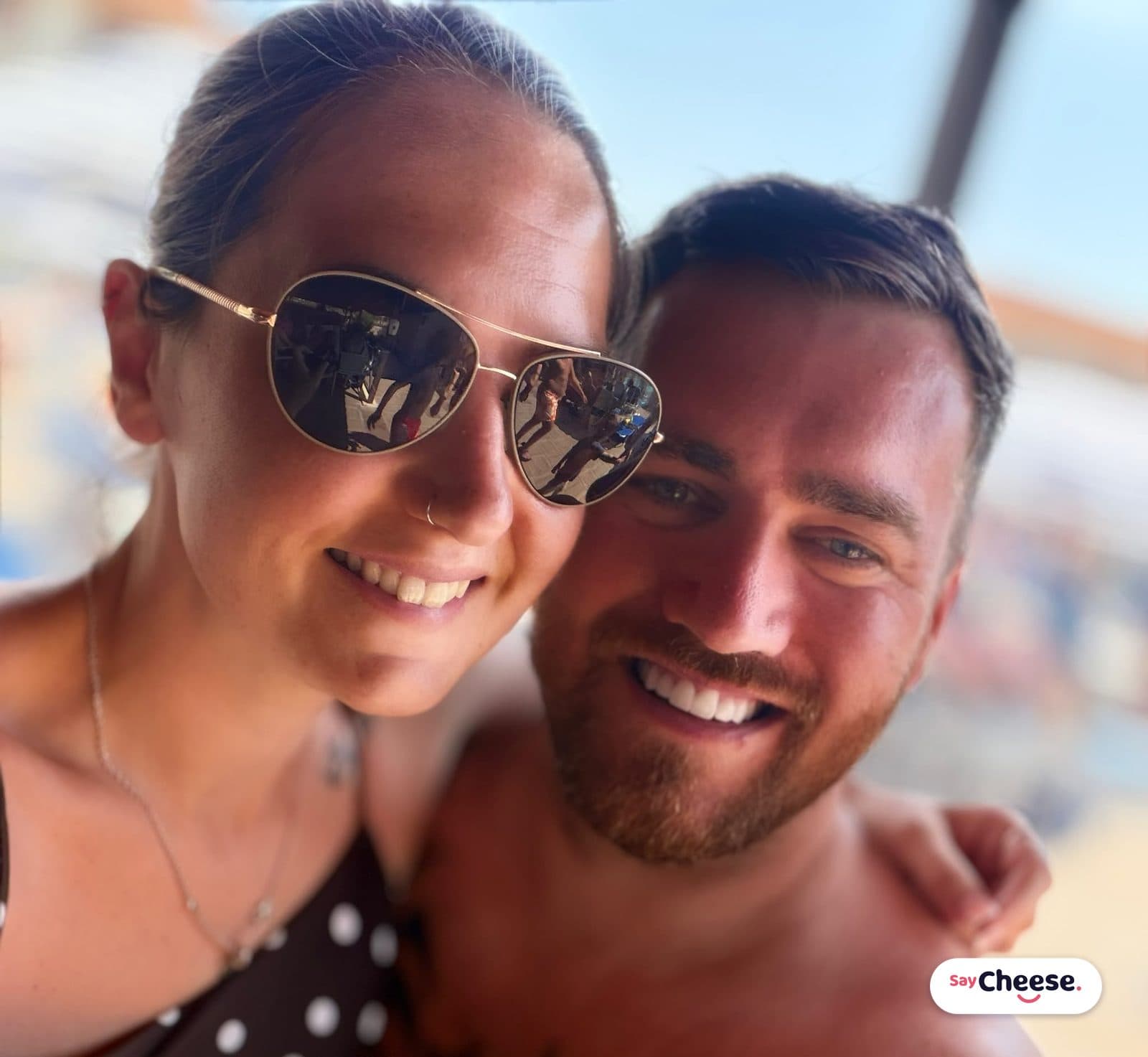 Guests grinning into a selfie together